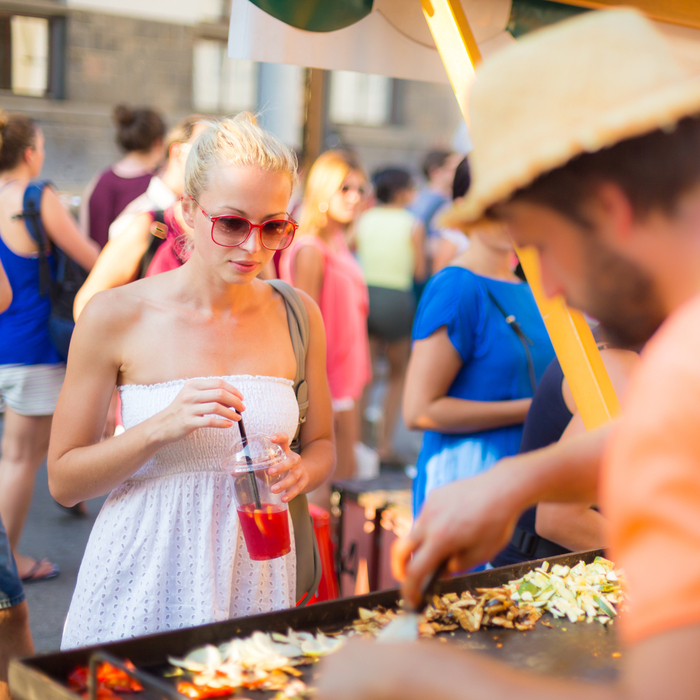 Woman looking at food stall