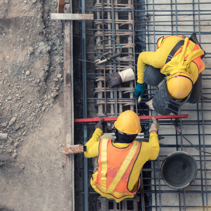 Two workers on construction site